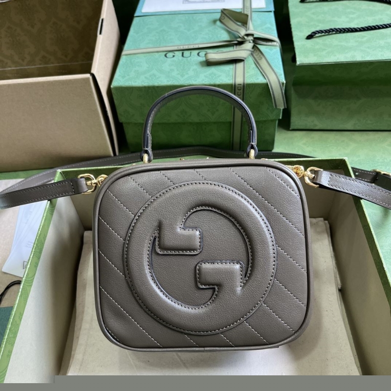 G*u*i top handle bags